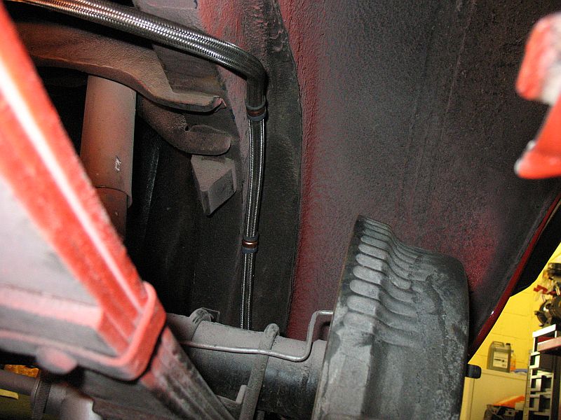 Sandy. See how there is a recessed area for the fuel line? I could have squeezed it up there with the clips inverted maybe?