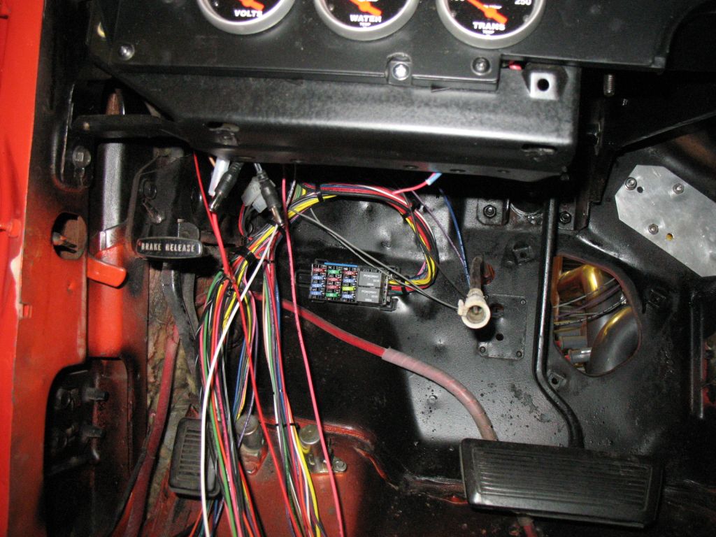I mounted the fuse box to the left of the steering column.