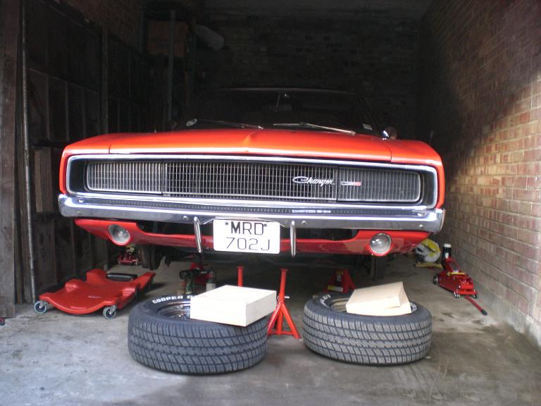 car up off the ground ready to strip