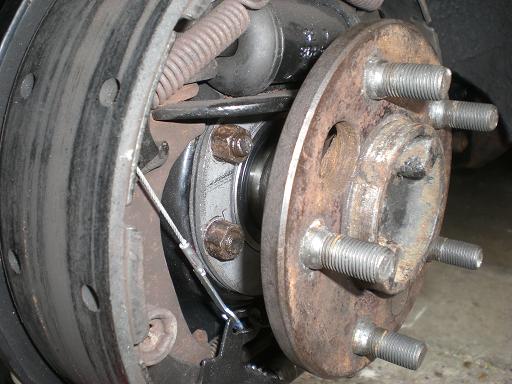 half shaft back in the car.The swapping of the bearings took about one hour and was alot simpler than what i thought it was going to be.there is no need to disturb the brakes when doing this job.After it was all back together i took the car for a test dri