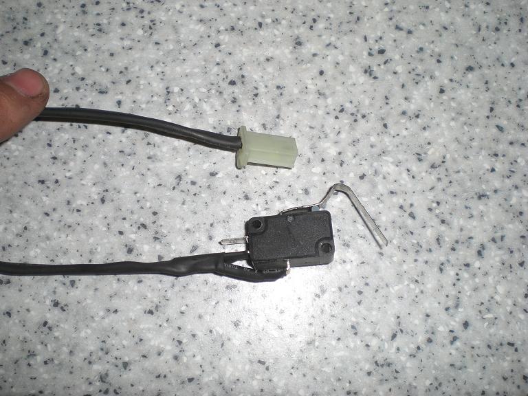 Micro switch arm bent and wires and plug soldered on