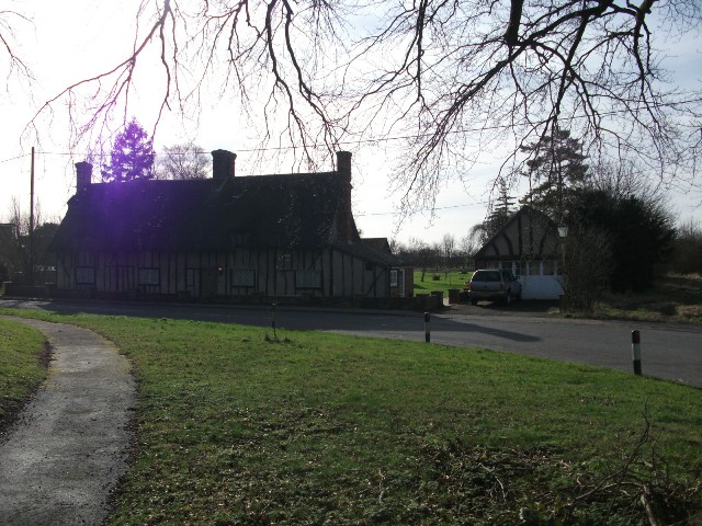 Shows the drive and garage, there is another access to the other side of the cottage
