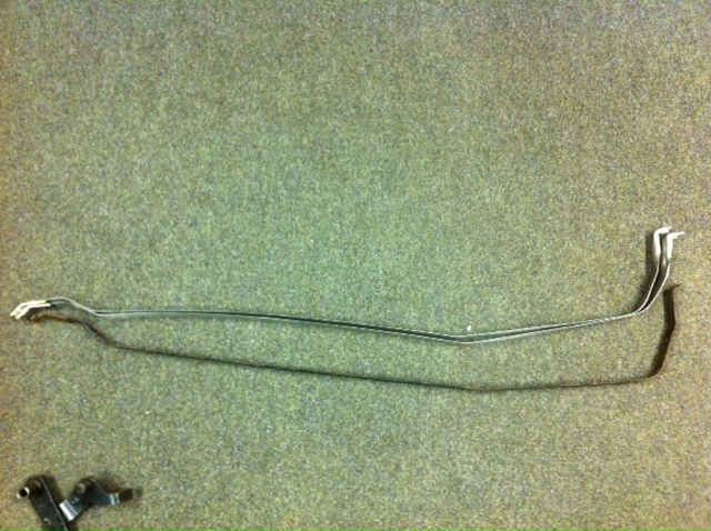 I made a set of new stainless steel gas tank straps as I didn't want to ship them from the states.