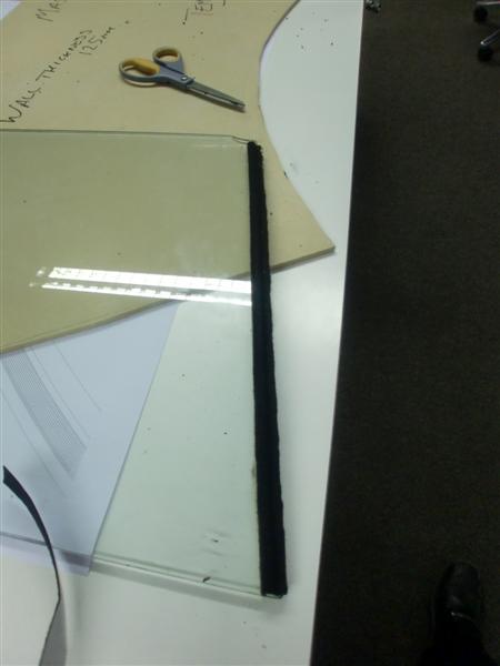 Tape added to front edge of glass