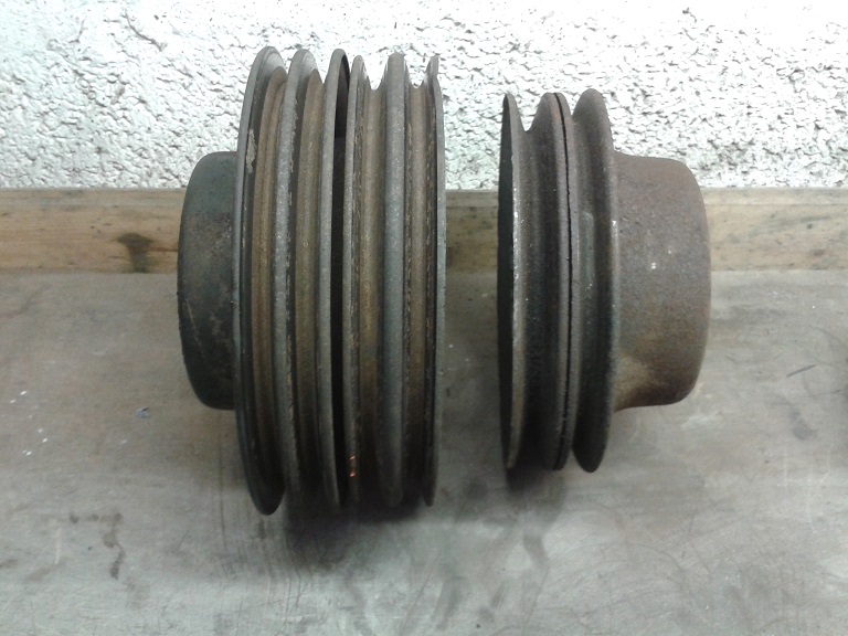 New non a/c crank pulley on the right