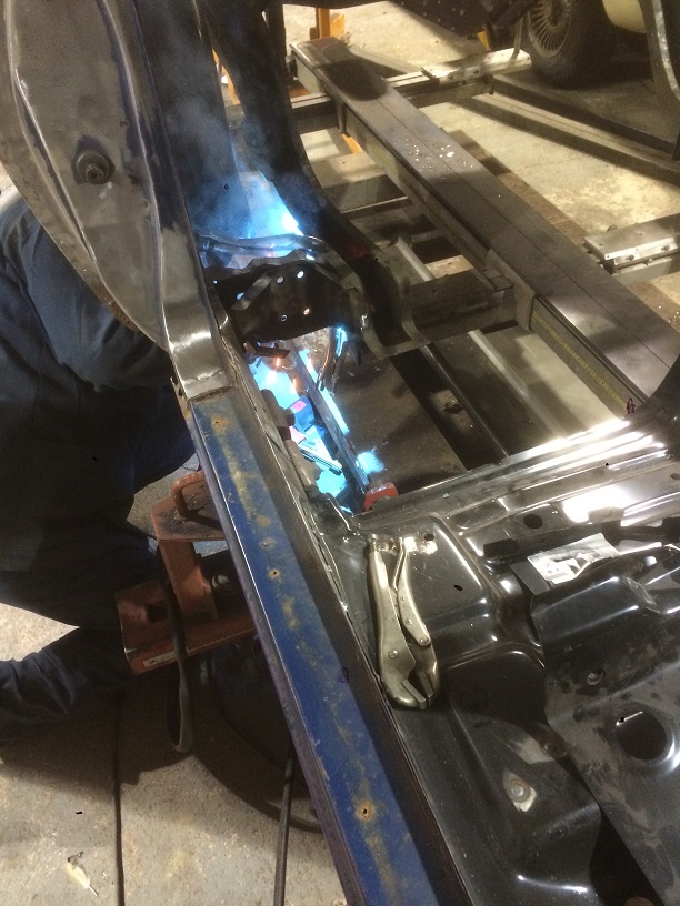 finally welding rear frame rails in