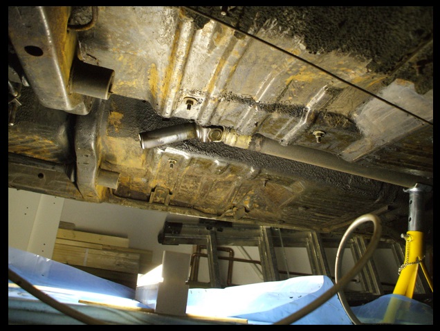 Scraping off the gunk.