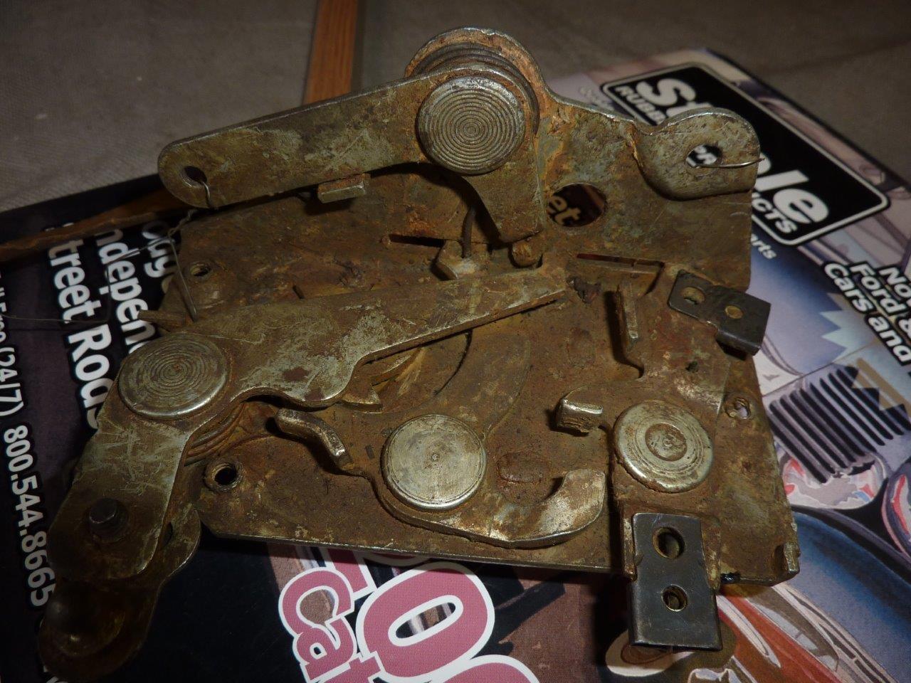 Pass side latch with NOS dirt.